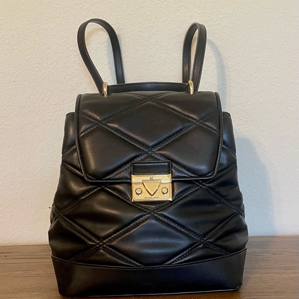 Michael Kors Black Quilted Backpack with Gold Lock